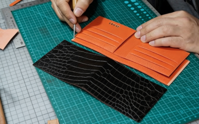 How should you reduce quality fluctuations with leather wallet OEM?